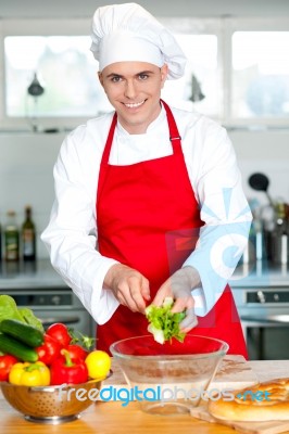 Chef Preparing The Dish Stock Photo