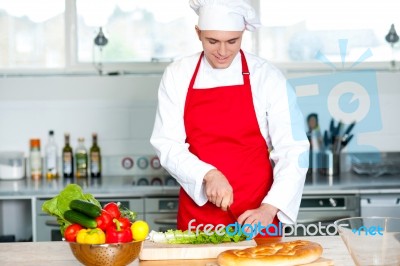 Chef Preparing The Dish Stock Photo