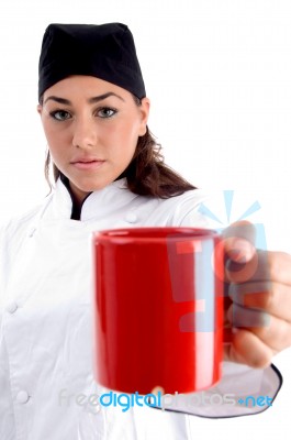 Chef Showing Coffee Mug Stock Photo