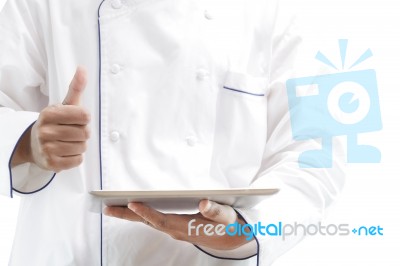 Chef Using Digital Tablet Stock Photo