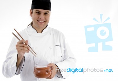 Chef with bowl and chopstick Stock Photo