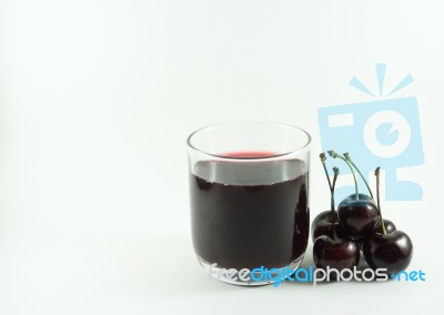 Cherry Juice And Cherries Stock Photo