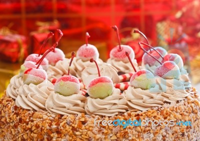 Cherry On Top Of Ice Cream Cake Stock Photo