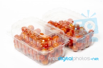 Cherry Tomato In Plastic Container Package, Studio Shoot On Whit… Stock Photo