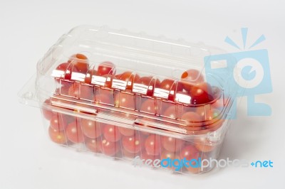 Cherry Tomato In Plastic Container Package, Studio Shoot On Whit… Stock Photo