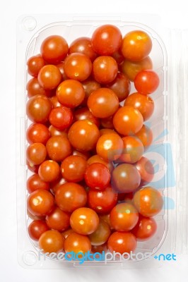 Cherry Tomato In Plastic Container Package, Studio Shoot On Whit… Stock Photo