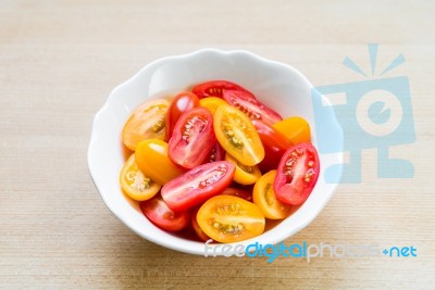 Cherry Tomatoes In White Bowl Stock Photo