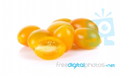 Cherry Tomatoes On A White Background Stock Photo