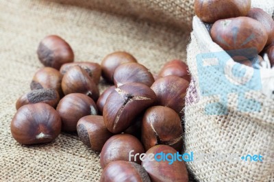 Chestnuts On Sack Stock Photo