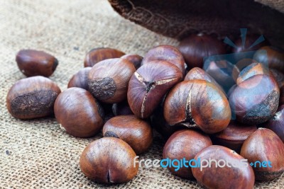 Chestnuts On Sack Stock Photo