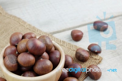 Chestnuts Roasted In Bowl Stock Photo