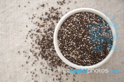 Chia Seeds In White Bowl Stock Photo