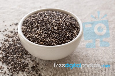 Chia Seeds In White Bowl Stock Photo