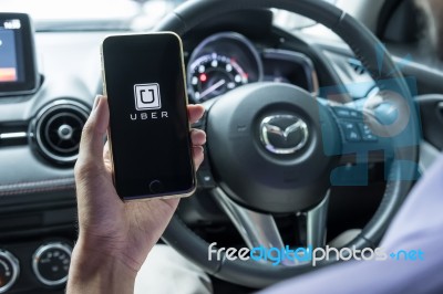 Chiang Mai,thailand - June 15, 2017 : A Man Hand Holding Uber Ap… Stock Photo