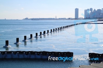 Chicago Skyline In Winter, Frozen Lake Michigan Stock Photo