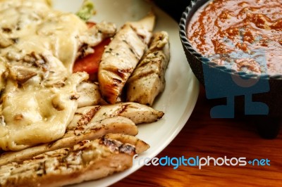 Chicken Fajitas On With Red Sauce Stock Photo