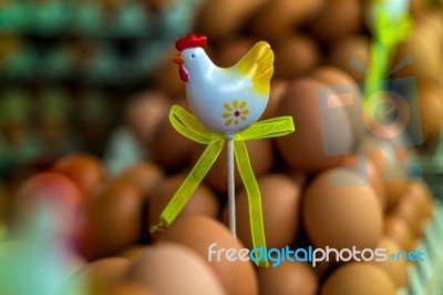 Chicken Figurine On Eggs Stock Photo