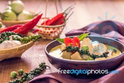 Chicken Mussaman Curry In Bowl Vegetables On Wooden Background Stock Photo