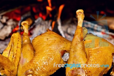 Chicken Roasting On Skewer Stock Photo