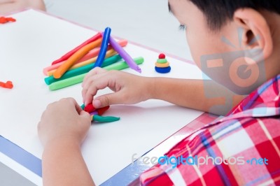 Child Moulding Whale Modeling Clay, On White Background. Strengthen The Imagination Of Child Stock Photo