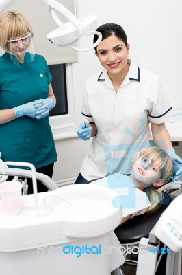 Child On Her Dental Check Up Stock Photo