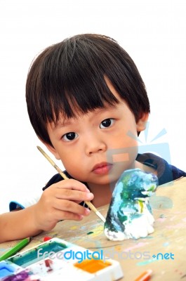 Child Painting Stock Photo