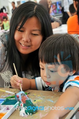 Child Painting Stock Photo