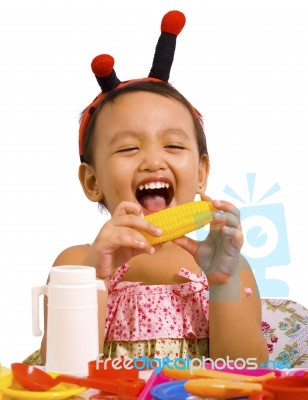 Child Playing With Toy Food Stock Photo