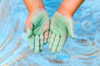 Child Showing Green Hands With Chalk Stock Photo