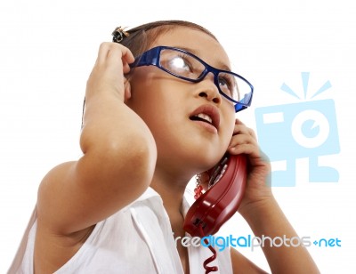 Child Talking On Phone Stock Photo