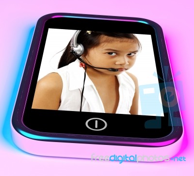 Child Wearing Headset On Mobile Stock Image