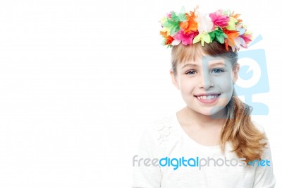 Child Wearing Wreath Of Flowers Stock Photo