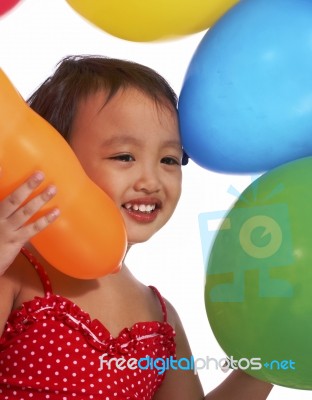 Child With Balloons Stock Photo