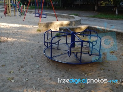 Children Playground, Swing Near The House  Stock Photo