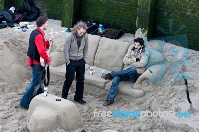 Chilling In A Sand Lounge By The River Thames Stock Photo