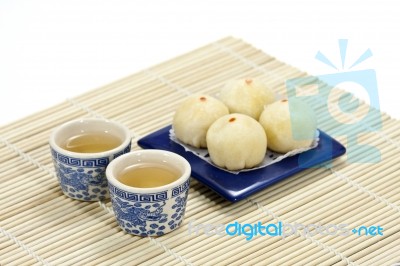 Chinese Cake With Tea Stock Photo