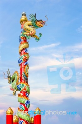 Chinese Dragon On The Ploe Stock Photo