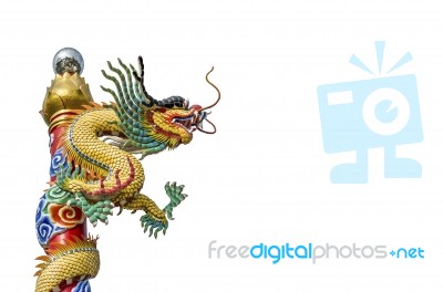 Chinese Dragon On The Ploe Stock Photo