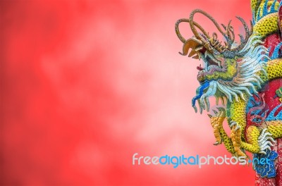 Chinese Dragon On The Ploe Stock Photo