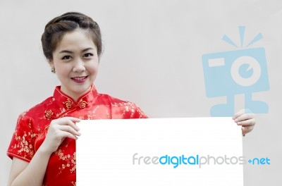 Chinese Girl Holding Blank Board Stock Photo