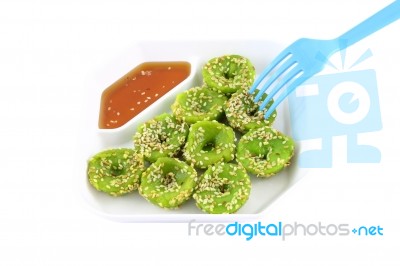 Chinese Green Coconut Milk Custard And Blue Fork Stock Photo