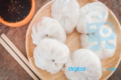 Chinese Leek Steamed Dessert On Wooden Table Stock Photo