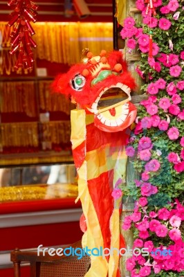 Chinese Lion At Gold Shop Stock Photo