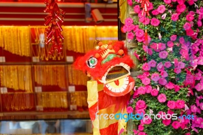 Chinese Lion At Gold Shop Stock Photo