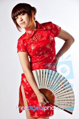 Chinese Model In Traditional Cheongsam Dress Stock Photo