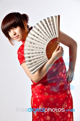 Chinese Model In Traditional Cheongsam Dress Stock Photo