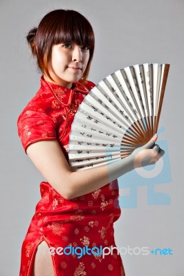 Chinese Model In Traditional Cheongsam Dress Stock Photo