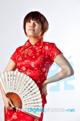 Chinese Model In Traditional Cheongsam Dress Stock Photo