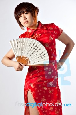 Chinese Model In Traditional Cheongsam Dress Stock Photo