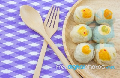 Chinese Pastry Mung Bean Or Mooncake With Egg Yolk On Wooden Dish And Spoon Fork Striped Cloth Stock Photo